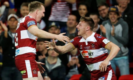 Tom Davies (right) celebrates scoring a try for Wigan. ‘I never made my school teams or town teams; everyone else just got snapped up and I was left with no deal.’