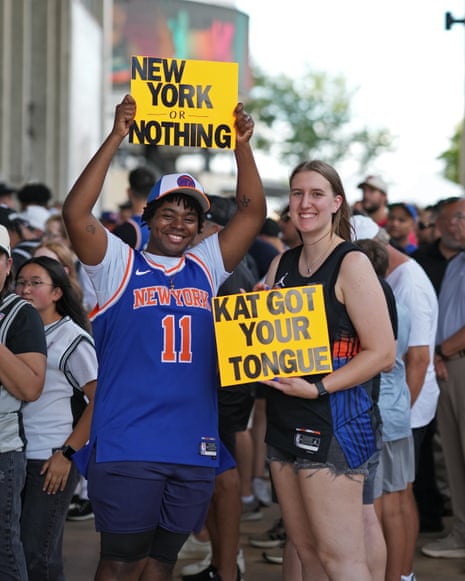 Knicks fans pose for a photo outside the Frost Bank Center ahead of Game 5.