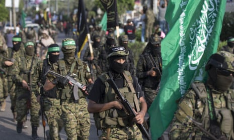 Militants from the Izz ad-Din al-Qassam Brigades, the armed wing of the Palestinian Hamas movement, parade in Gaza City on Tuesday.