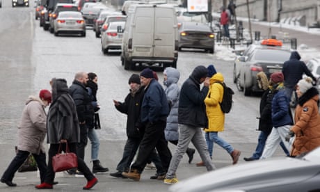 People crossing a road in Kyiv, Ukraine
