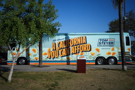 A campaign bus for California gubernatorial candidate Tom Steyer is parked in the lot of Pan Pacific Park before a campaign event in Los Angeles, on 7 May 2026.