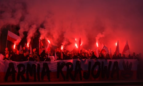 Polish nationalists at a 2017 march in Warsaw, which was attended by far-right figures including Tommy Robinson and Roberto Fiore.