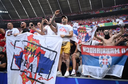 Serbia fans celebrate after the Euro 2024 group match against Slovenia