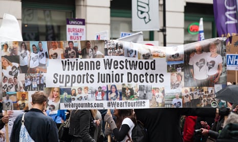 Banner reading 'Vivienne Westwood supports junior doctors' at a student nurses and midwives rally