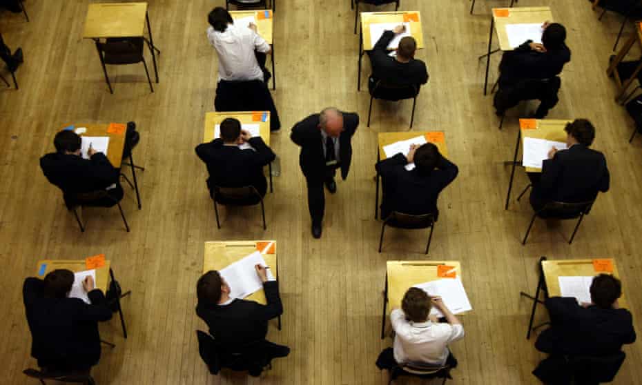 Pupils sitting a pen-and-paper exam