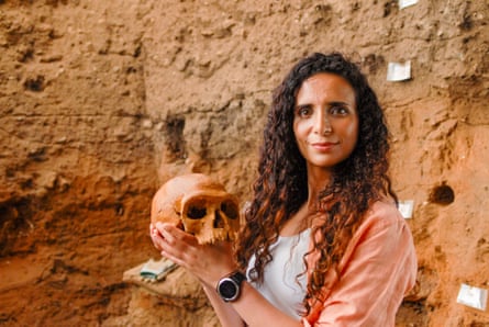 Paleoanthropologist Ella Al-Shamahi holding Irhoud 1 skull cast in Rabat, Morocco in Human.