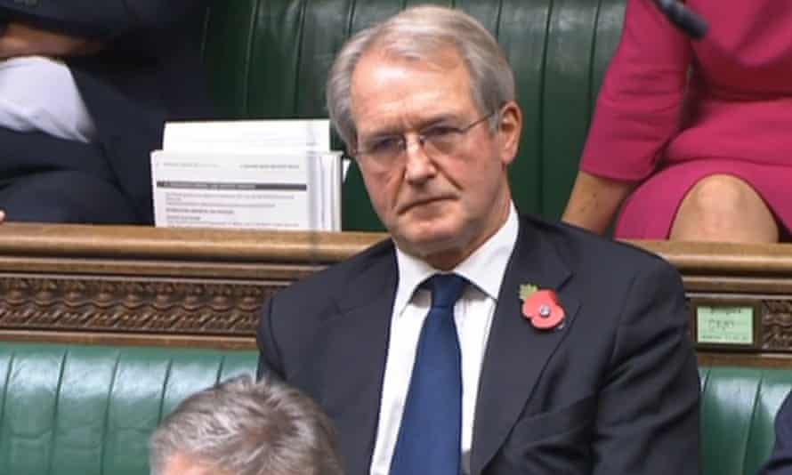 Owen Paterson sits in the Commons as MPs debate an amendment calling for a review of his case