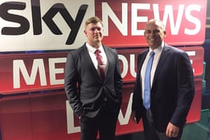 Far-right extremist Blair Cottrell with Adam Giles in front of the sky news sign.