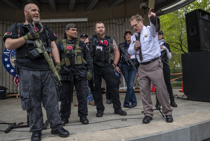 Dar Leaf, front right, with members of the Michigan Liberty Militia at Rosa Parks Circle in Grand Rapids, 18 May, 2020