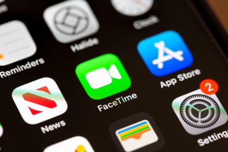Closeup of an iPhone screen with apps including News, Facetime and the App Store