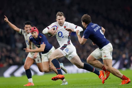 Elliot Daly runs away from Antoine Dupont to score the match-winning try for England against France.