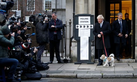 Boris Johnson outside the polling station in London with his dog, Dilyn