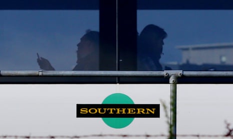 passengers silhouetted in a train carriage
