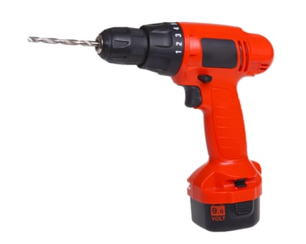 A red cordless power drill tool cut out isolated on white background