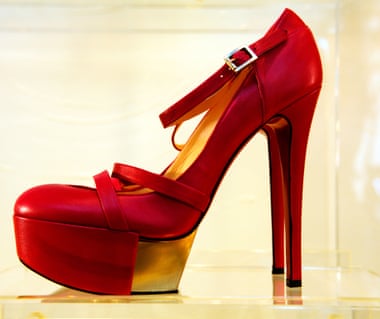 Red high heels in a window display