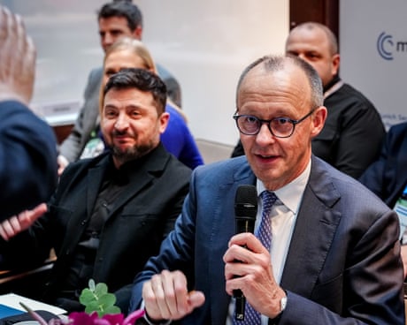 Volodymyr Zelensky sits next to Friedrich Merz at the 62nd Munich security conference.