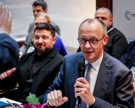 Volodymyr Zelensky sits next to Friedrich Merz at the 62nd Munich security conference.