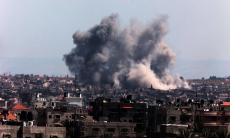 A picture taken from Rafah shows smoke billowing over Khan Younis in the southern Gaza Strip during Israeli bombardment, on Monday 11 March 2024.