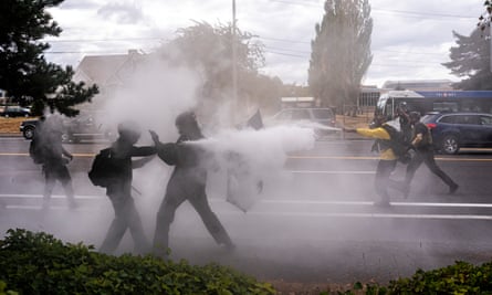 Mace and smoke filled the air in suburban Portland on Sunday.