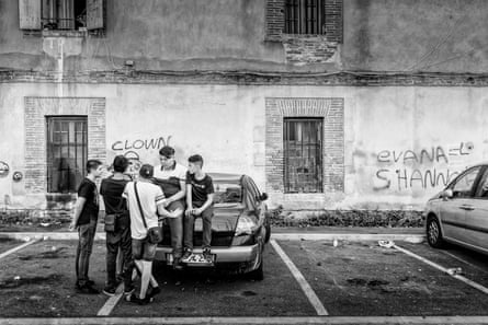 Youths gather in a car park behind the Caserne St Jacques on the Place du Puig. The former military building, which dates from the 17th century, now houses low-income families in council-owned apartments.