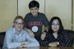 Jeremy Shuler, 12, a freshman at Cornell University, poses with his parents Andy and Harrey, on campus in Ithaca, N.Y.