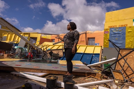 Lisa Frazer Lyttle, principal of the Gurney's Mount Primary School, amid the rubble that remains in the aftermath of Hurricane Melissa.