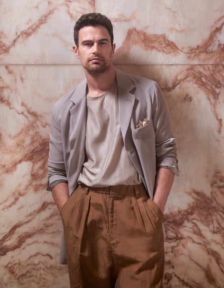 Theo James wears blazer, top and trousers, all Giorgio Armani