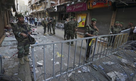 Lebanese soldiers at the scene of the bombings