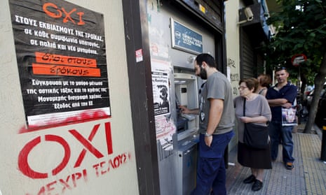 Referendum campaign posters reading ‘no’ at a cash machine in Athens. 
