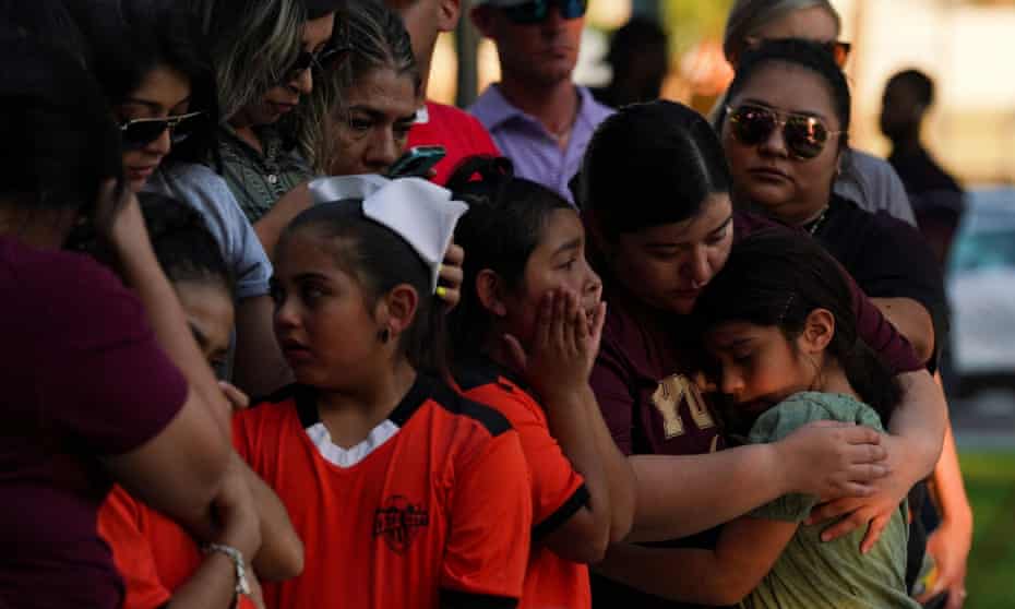 ‘There have been more mass shootings in the US in 2022 than days of the year.’ People mourn victims of the Robb elementary school mass shooting, in Uvalde, Texas, 26 May 2022.