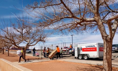 Volunteers unload goods at the relief fund’s makeshift distribution center at Mount Valley high school, Oljato, Utah.