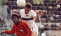 Luigi Riva, right, jumps over Arsène Auguste during Italy’s group game match against Haiti in the 1974 World Cup.