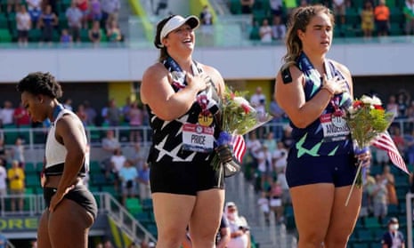 Gwen Berry (left) turns away during the national anthem at the US Olympic trials