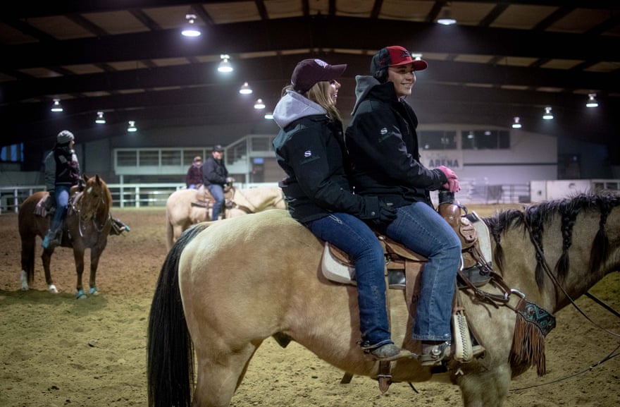 Simonson and Alexis Rose, a close friend, mess around on horseback together at the first University of Montana rodeo team practice of 2019 in February, outside of Lolo, Montana.