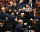 Scuffle breaks out in Albanian parliament over student protests – video
