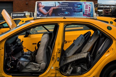 A burned out taxi in a garage in Long Island City, Queens.