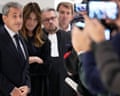 Nicolas Sarkozy, next to his wife, Carla Bruni-Sarkozy