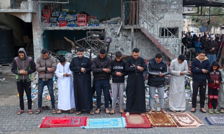 Eid prayers outside a destroyed mosque in Rafah.