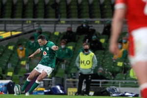Ireland’s fly-half Jonathan Sexton kicks the first penalty.
