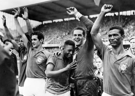 After Brazil beat Sweden 5-2 in the 1958 World Cup final, 17-year-old Pele cries on goalkeeper Gilmer's shoulder.