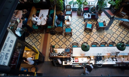 An aerial view of the ground floor of Dishoom restaurant in Kings Cross, decorated to give the feel of 1930s Bombay