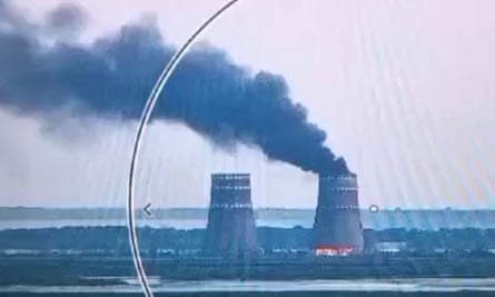 A grab from video released by the Ukrainian Presidential Press Service on 11 August 2024, shows a fire in a cooling tower at the Russian-controlled Zaporizhzhia nuclear power plant in Ukraine.