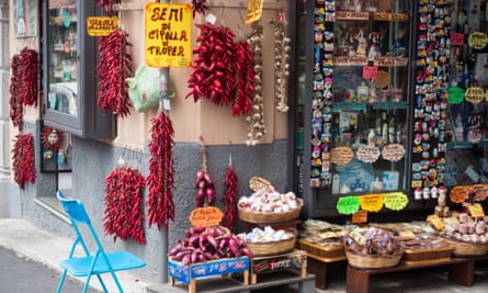 Spicy Calabrian peppers and local onions for sale in Tropea.