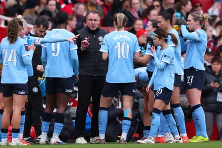 Manchester City’s manager, Andrée Jeglertz, speaks to his players at Arsenal in February
