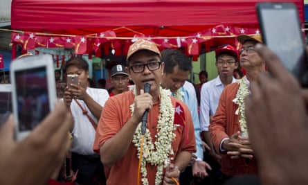 Blogger and internet freedom activist Nay Phone Latt, centre, for the NLD, delivers a speech during the election campaign.