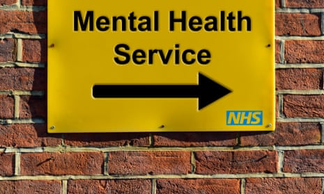 a Mental Health Service, NHS wall mounted direction sign.