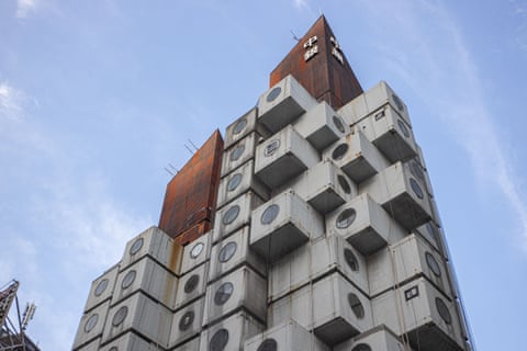 A exterior general view of the Nakagin Capsule Tower in Ginza, Tokyo, Japan.
