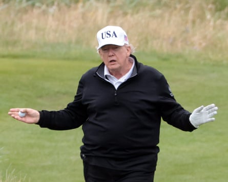 Donald Trump plays a round at Turnberry golf club on Sunday.