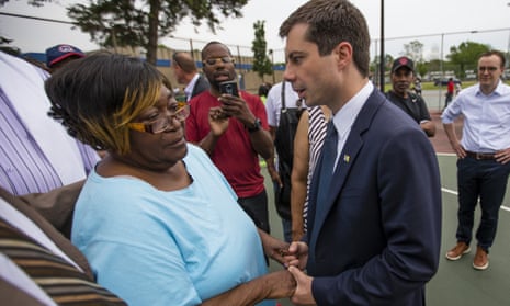 Pete Buttigieg shares a moment with Shirley Newbill, mother of Eric Logan, in South Bend, Indiana on 19 June 2019.