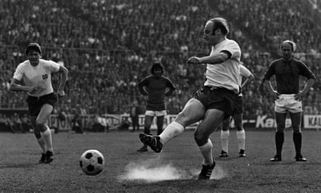 Uwe Seeler, pictured taking a penalty in his farewell match for Hamburg in 1972, has died at the age of 85